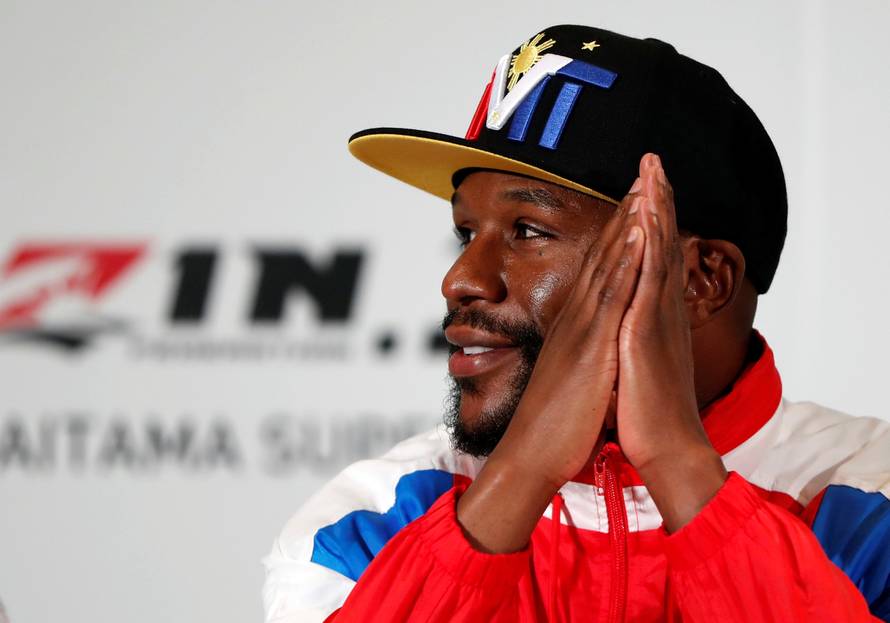 Boxer Floyd Mayweather Jr. of the U.S. attends a news conference in Tokyo