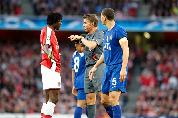 LONDON, UNITED KINGDOM: 05 MAY 2009 UEFA appointed match referee Roberto Rosetti (C) gestures during the UEFA Champions 