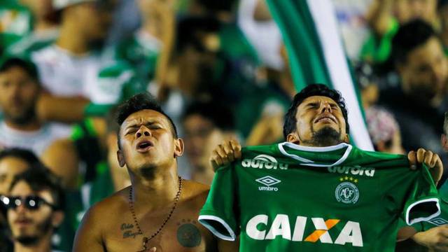 Fans of Chapecoense soccer team pay tribute to Chapecoense's players at the Arena Conda stadium in Chapeco