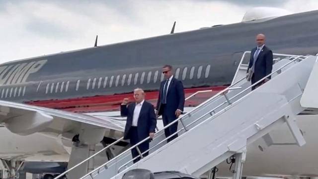 Republican presidential candidate Donald Trump arrives at Milwaukee Mitchell International Airport