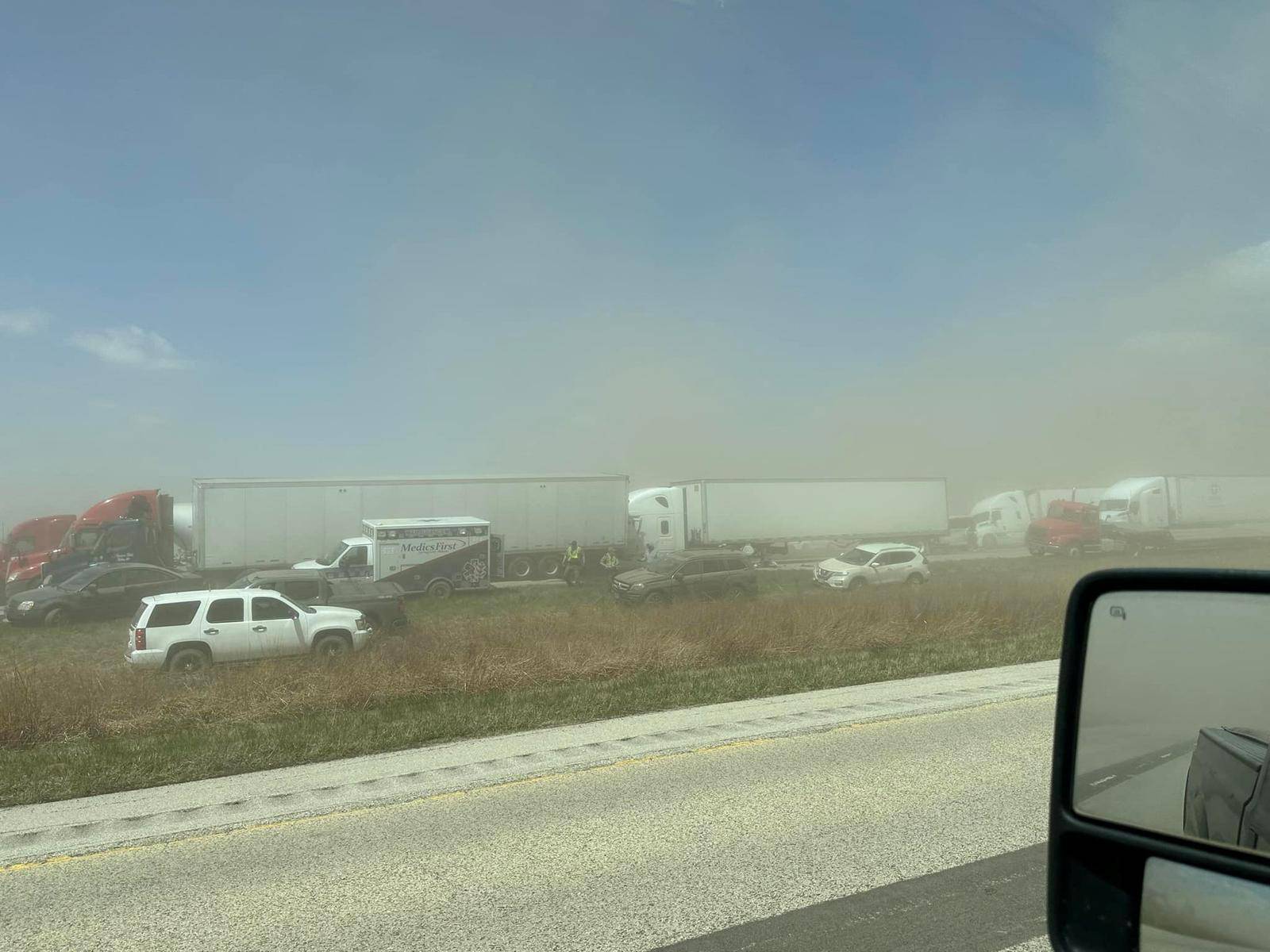 A view of vehicles in a dust storm