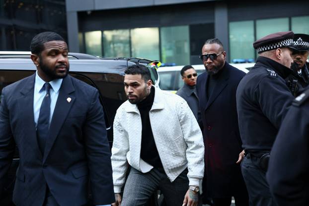 U.S. singer Chris Brown appears outside the Southwark Crown Court, in London