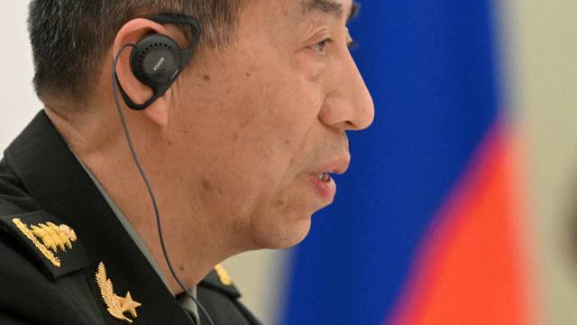 FILE PHOTO: Russian President Vladimir Putin meets Chinese Defence Minister Li Shangfu in Moscow