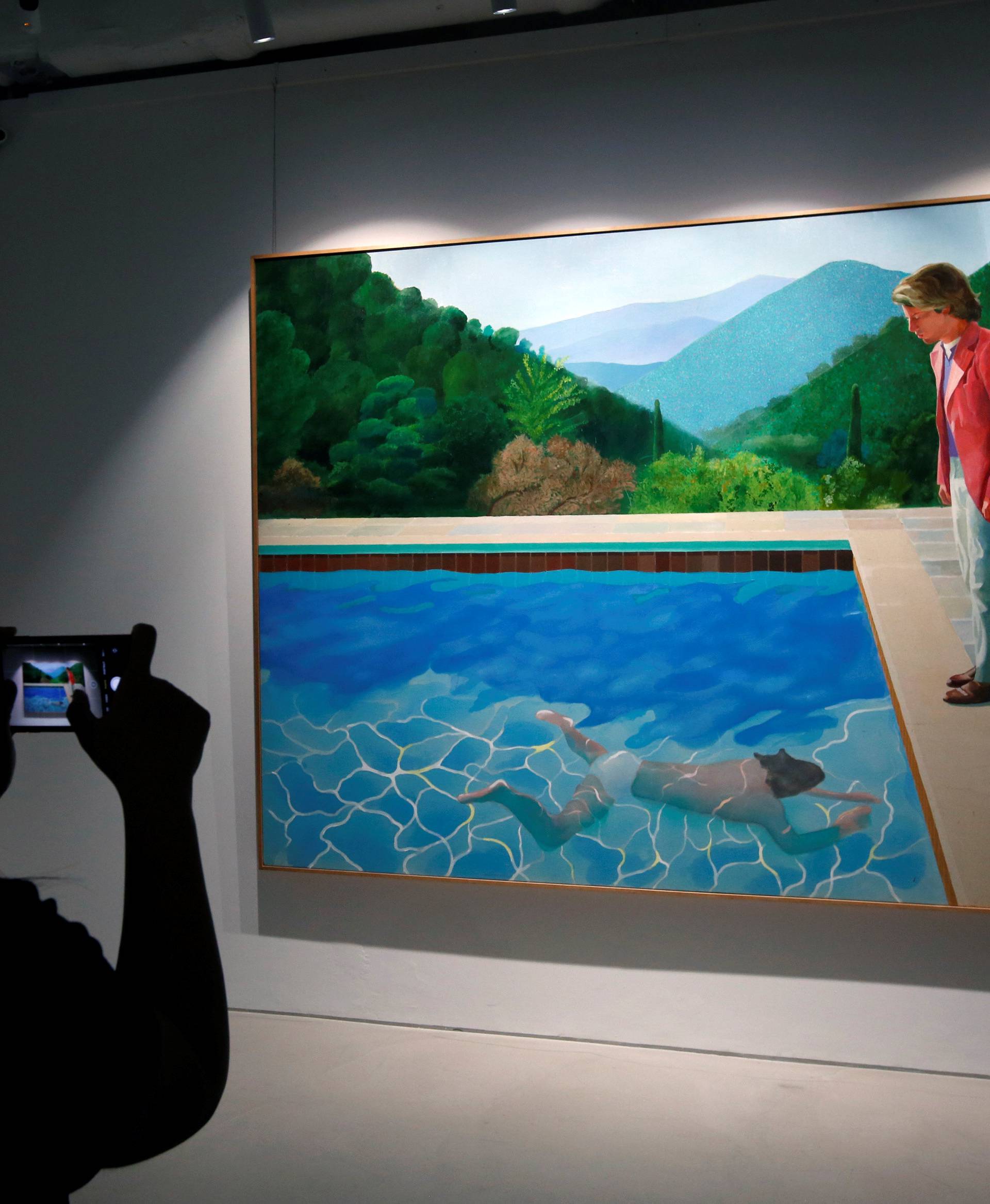 David Hockney's "Portrait of an Artist (Pool with Two Figures)" is displayed at Christie's preview in Hong Kong