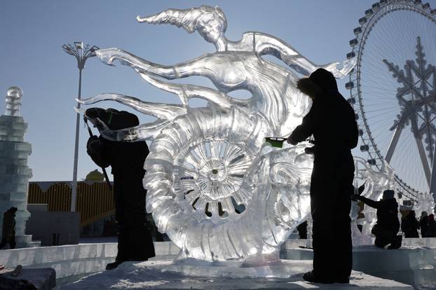 Participants prepare for the ice sculpture contest at the annual Ice and Snow Festival in Harbin