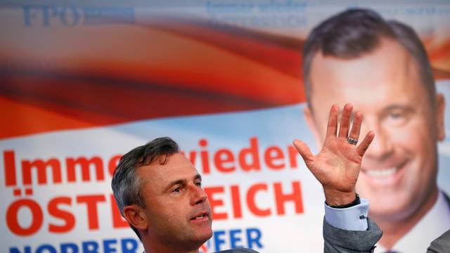 Austrian far right Freedom Party presidential candidate Hofer addresses a news conference in Vienna