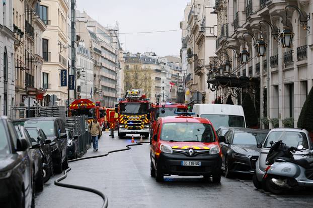 French firefighters work a fire broke out at Paris luxury Bristol Hotel