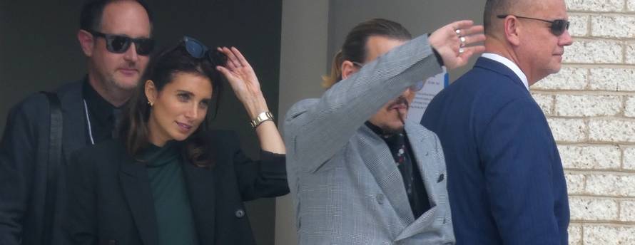 Johnny Depp made his way to the back of the court house for his routine smoke and joined by his UK Lawyer, Joelle Rich during the Johnny Depp vs Amber Heard Trial.