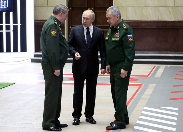 Russian President Vladimir Putin attends a meeting of Defence Ministry Board in Moscow