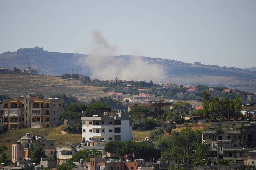 Smoke rises following an Israeli strike in Nabatieh