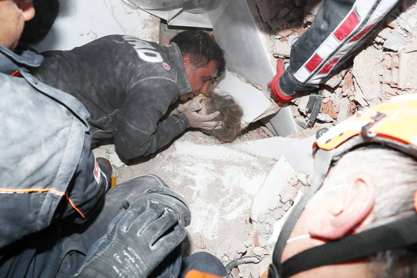 Rescue workers search for earthquake survivors in Izmir