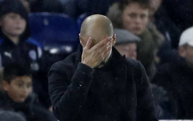 Manchester City manager Pep Guardiola looks dejected