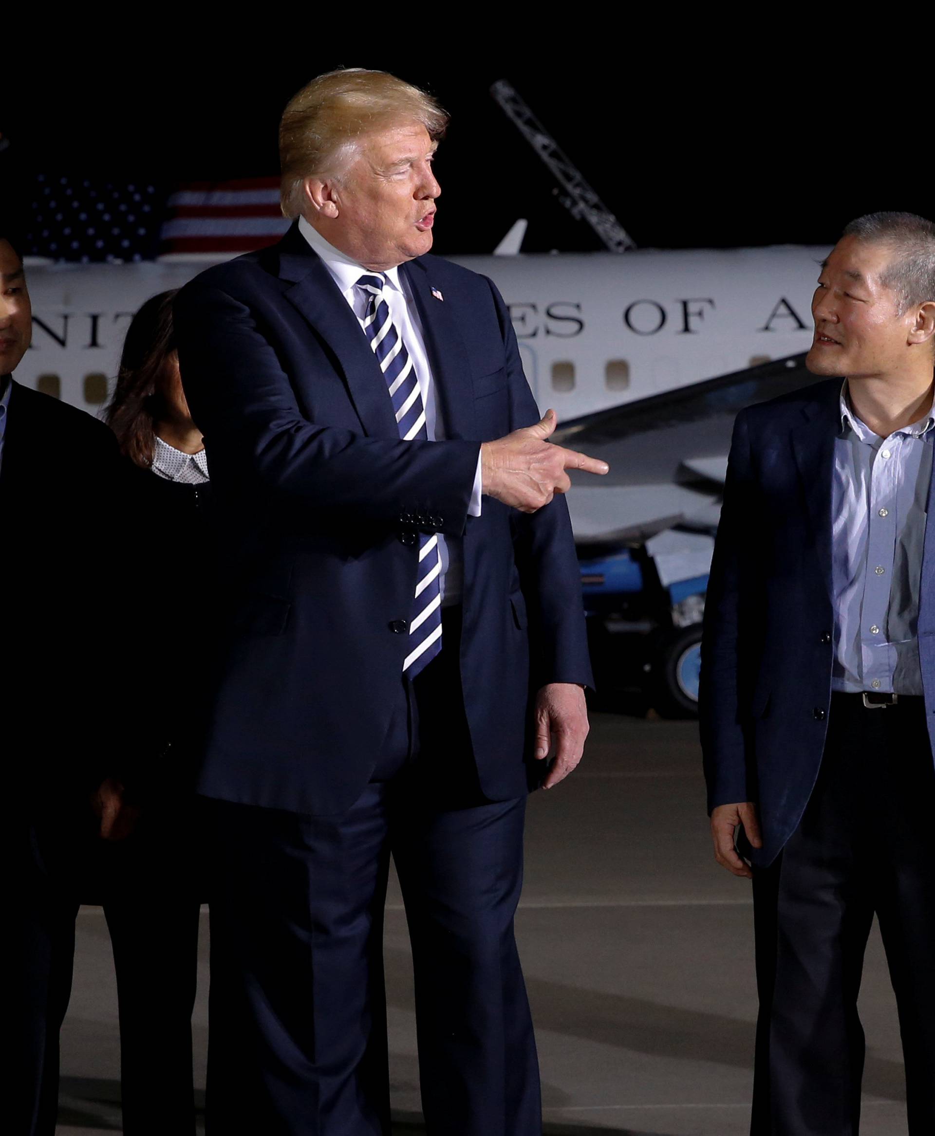U.S.President Donald Trump greets the Americans released from detention in North Korea, Tony Kim, Kim Hak-song and Kim Dong-chul, upon their arrival at Joint Base Andrews