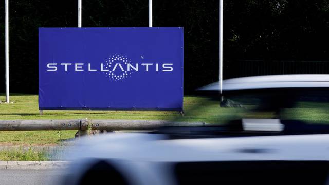 FILE PHOTO: The logo of Stellantis at the entrance of the company's factory in Hordain