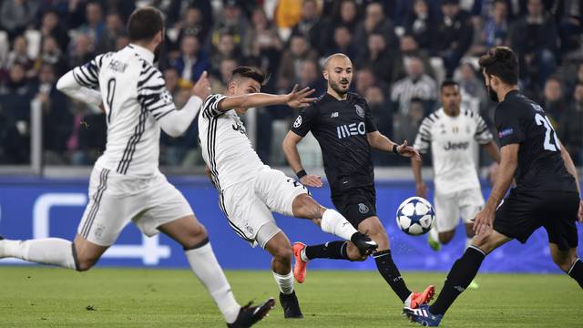 Juventus' Paulo Dybala shoots at goal