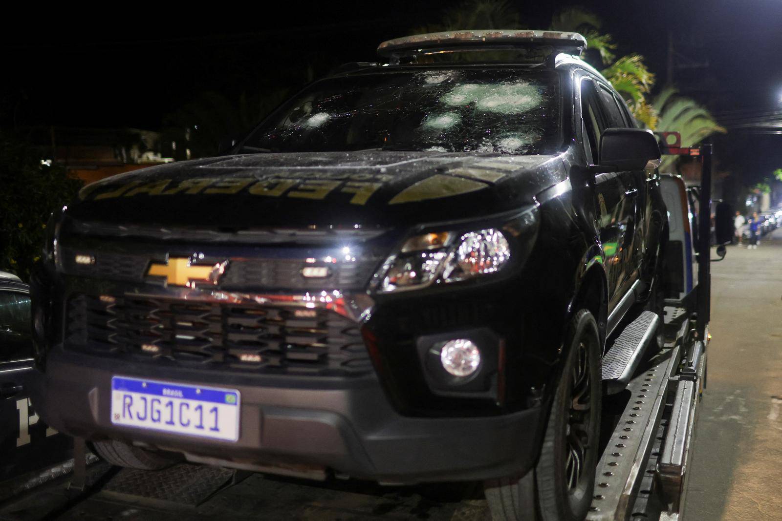 View of a federal police vehicle damaged after Brazilian politician Roberto Jefferson fired at police while resisting arrest in Comendador Levy Gasparian