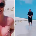 Britney se valjala po plaži bez grudnjaka, a hit postao čovjek u pozadini: 'Tko je ovaj tip!?'