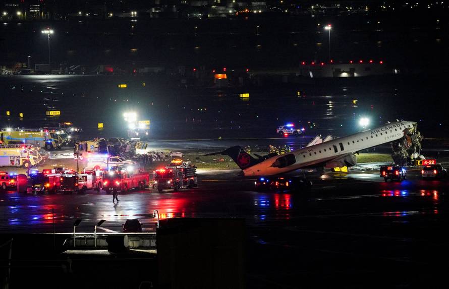Air Canada Express jet collides with a ground vehicle at LaGuardia airport