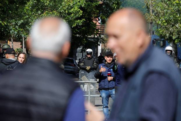 Polish Kosovo Force (KFOR) soldiers guard a municipal office in Zvecan