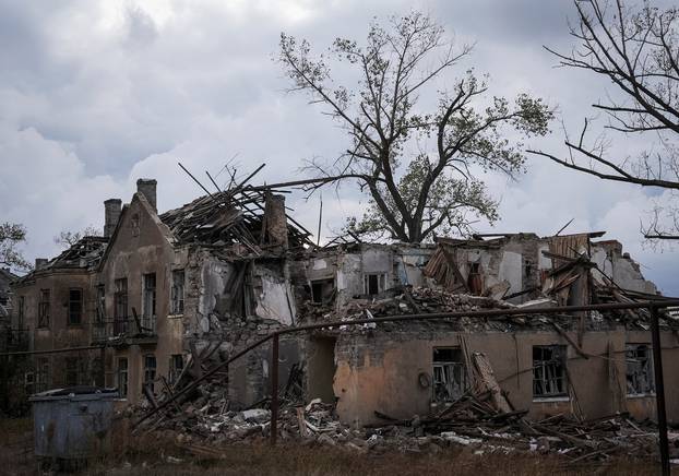 A view of a damaged residential building in the front line city of Chasiv Yar