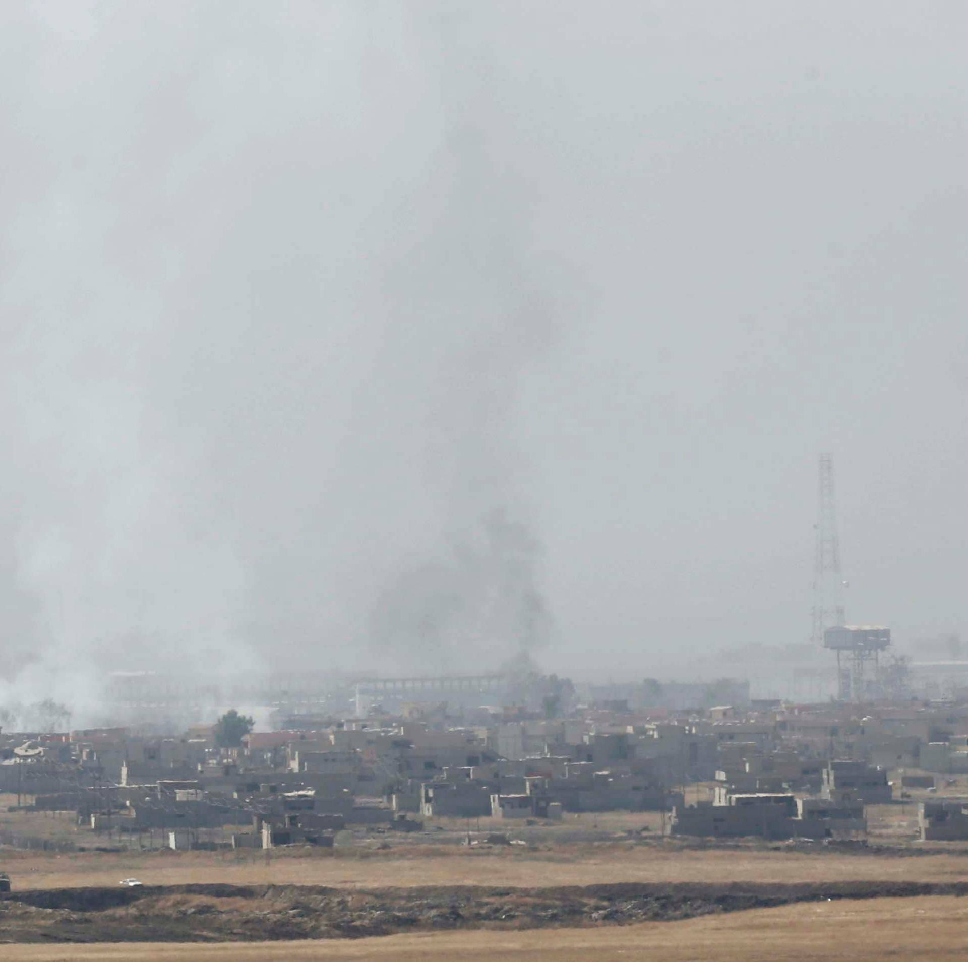 Smoke rises from clashes in the east of Mosul during clashes with Islamic State militants