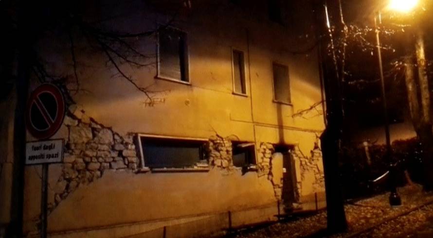 Still image from video shows damaged building after an earthquake in Visso