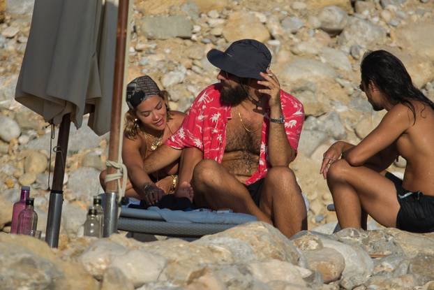 ** WARNING: Contains Nudity ** Rita Ora with friends and her new boyfriend Romain Gavras while on vacation in ibiza