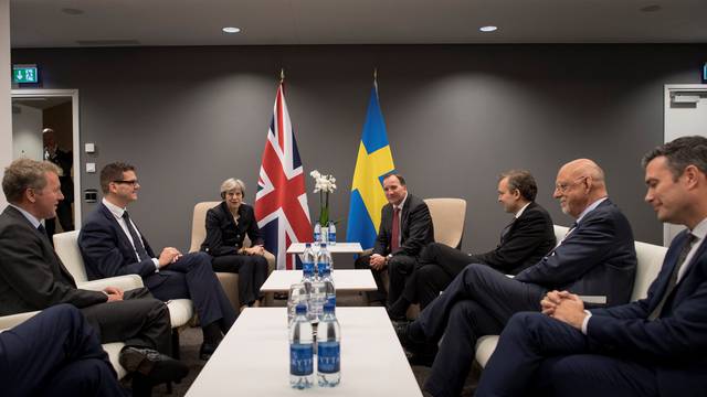 Britain's PM Theresa May meets with her Swedish counterpart Stefan Lofven at Gothia Towers Hotel on the eve of the EU Social Summit for Fair Jobs and Growth in Gothenburg
