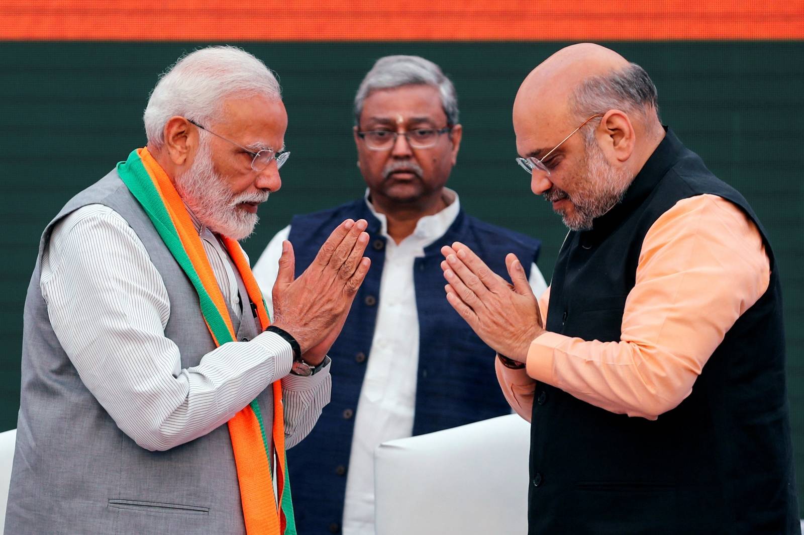FILE PHOTO: Indian Prime Minister Narendra Modi and chief of India's ruling Bharatiya Janata Party (BJP) Amit Shah, greet each other before releasing their party's election manifesto for the April/May general election in New Delhi