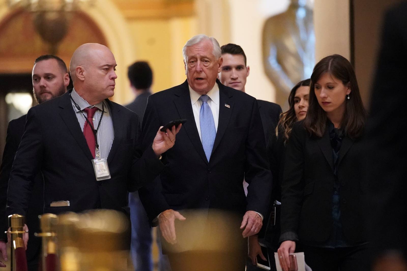 House Majority Leader Hoyer speaks to reporters inside Statuary Hall  prior voting in the U.S. House of Representatives on two articles of impeachment against U.S. President Donald Trump at the U.S. Capitol in Washington