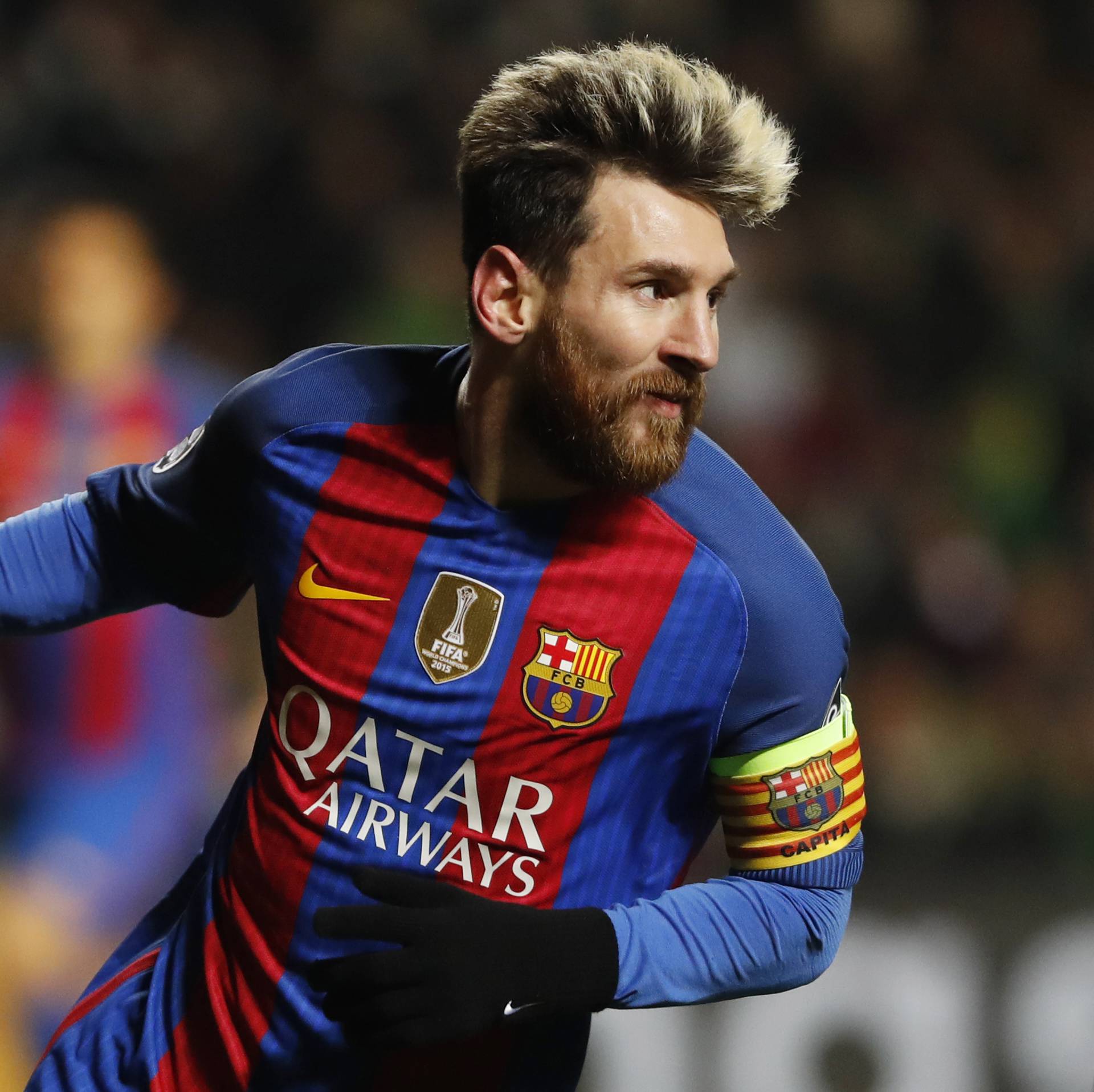 Barcelona's Lionel Messi celebrates scoring their first goal