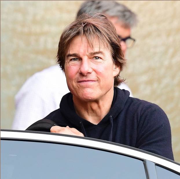*EXCLUSIVE* The American All Action Hero Tom Cruise is spotted landing at the Battersea Helipad with INEOS members David Horrocks and John Reece out in London.