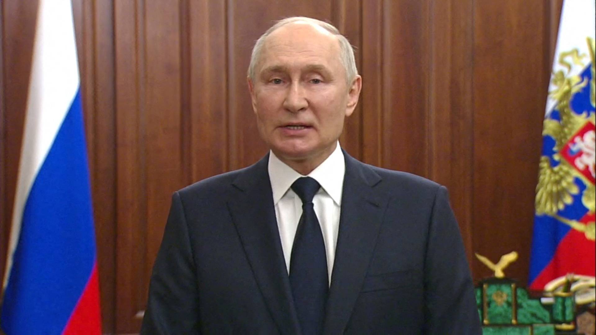 Russian President Vladimir Putin gives a televised address in Moscow