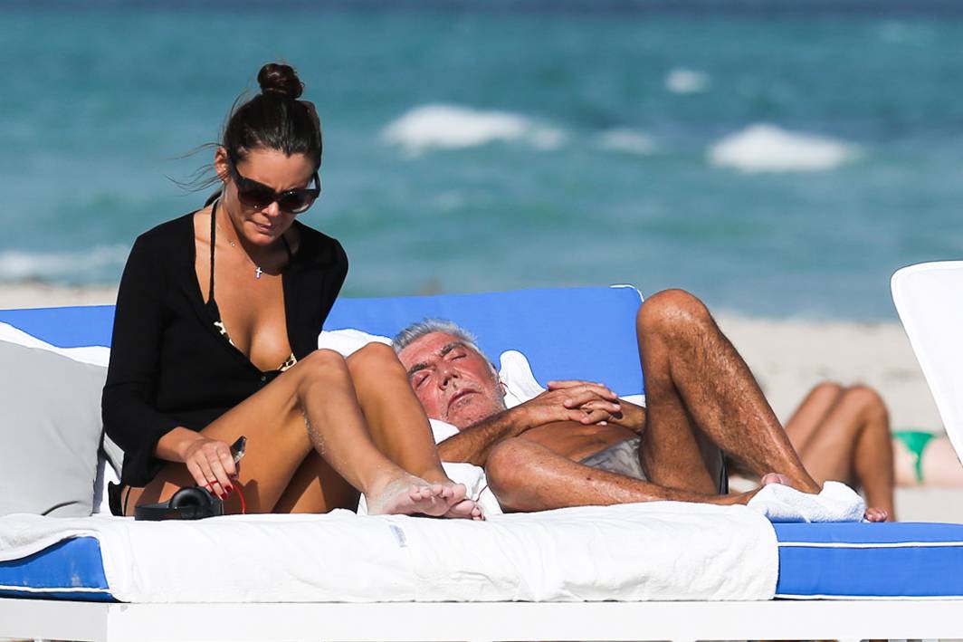 Roberto Cavalli relaxes at the beach with his new girlfriend