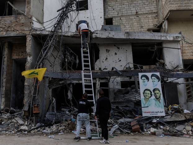 Workers try to fix internet cables amid a 10-day ceasefire between Lebanon and Israe