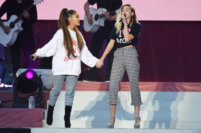 Ariana Grande and Miley Cyrus perform during the One Love Manchester benefit concert for the victims of the Manchester Arena terror attack at Emirates Old Trafford