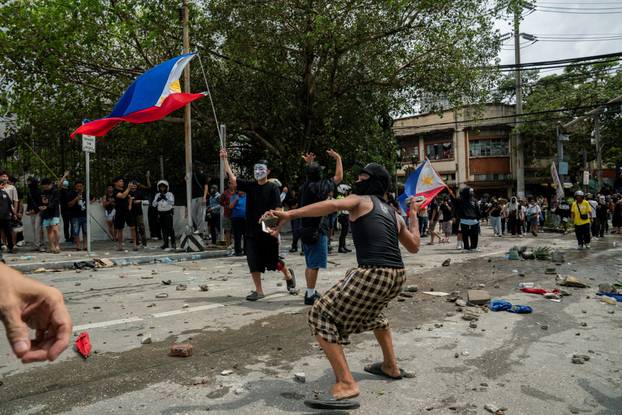 Filipinos protest to denounce what they say is corruption linked to flood control projects, in Manila