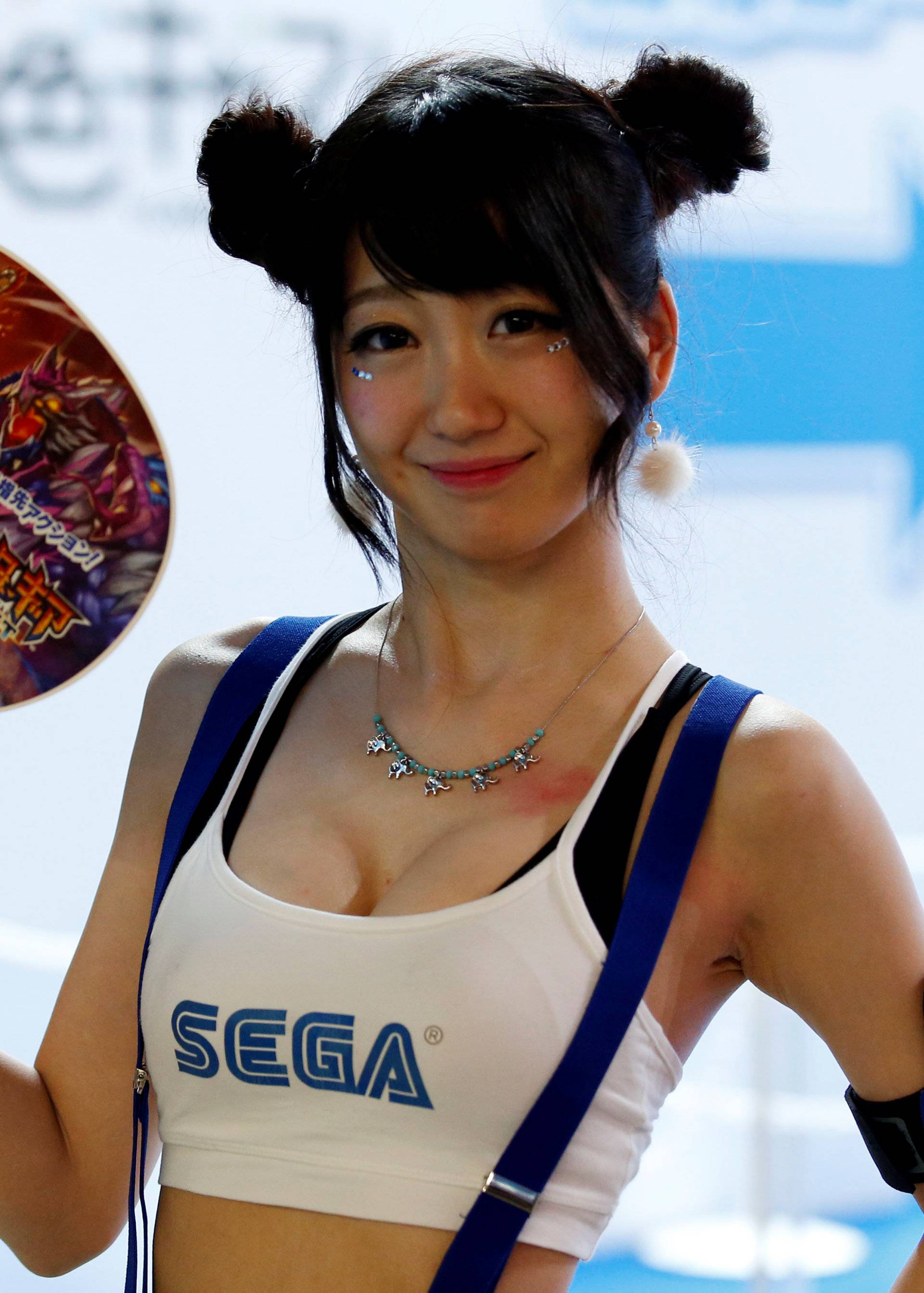 Sega's hostess poses for photographers at Tokyo Game Show 2016 in Chiba