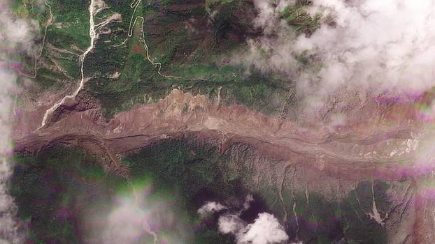 Satellite images show torrent of rock and ice high in Nepalese mountain valley after Nepal-China disaster