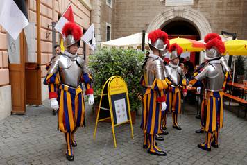 New recruits of the Vaticanâs elite Swiss Guard prepare for the swearing-in ceremony at the Vatican