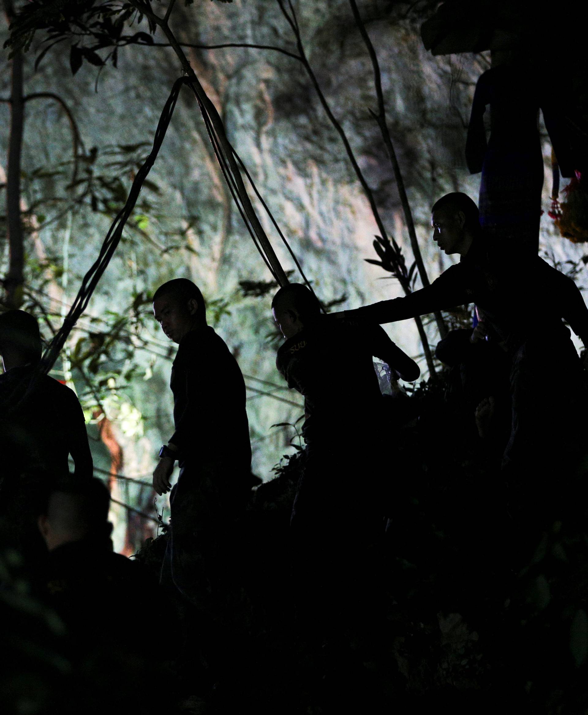 Military personnel are seen in front of the Tham Luang cave in the northern province of Chiang Rai