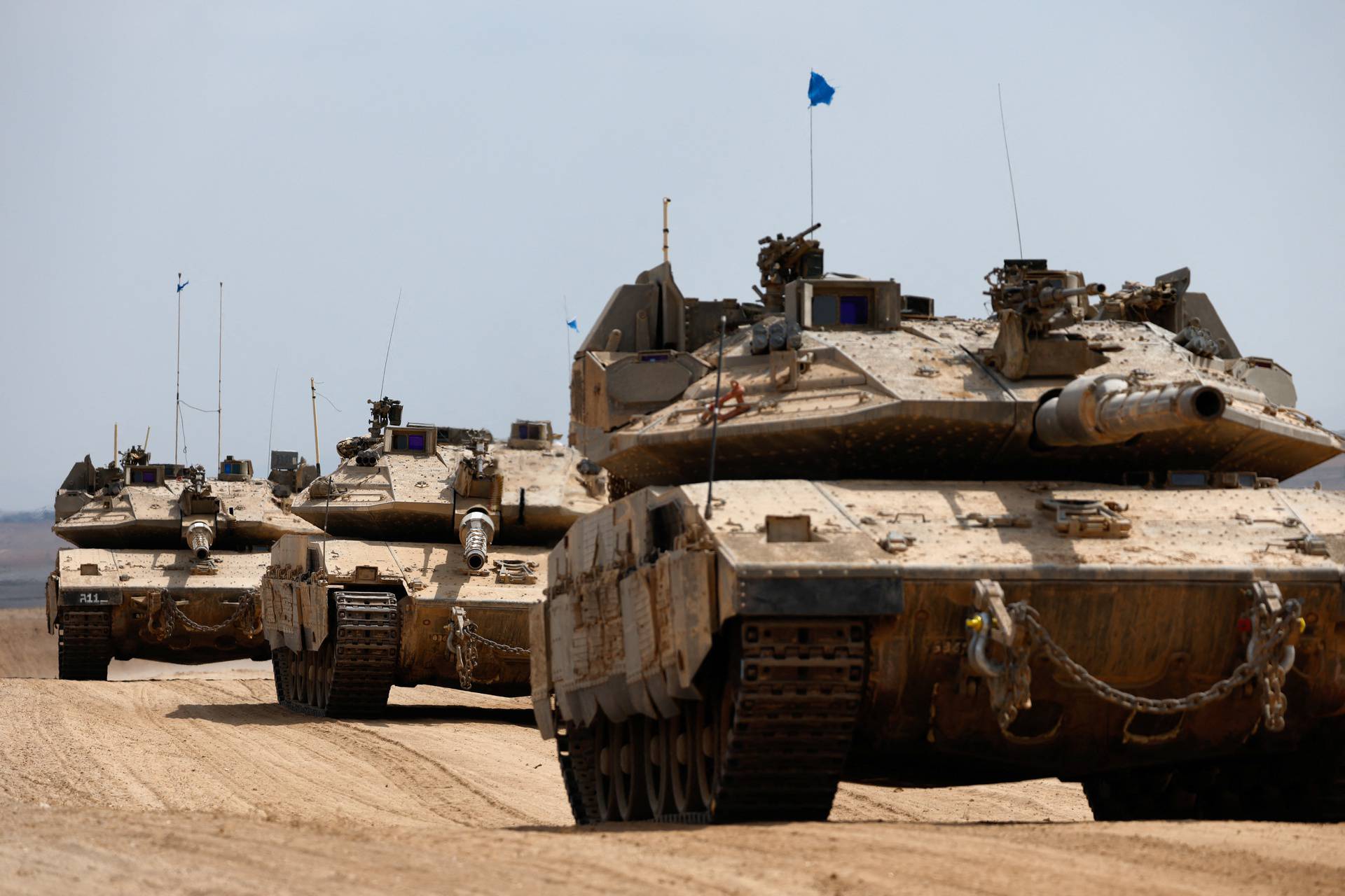 Israeli tanks make their way towards Gaza, in southern Israel