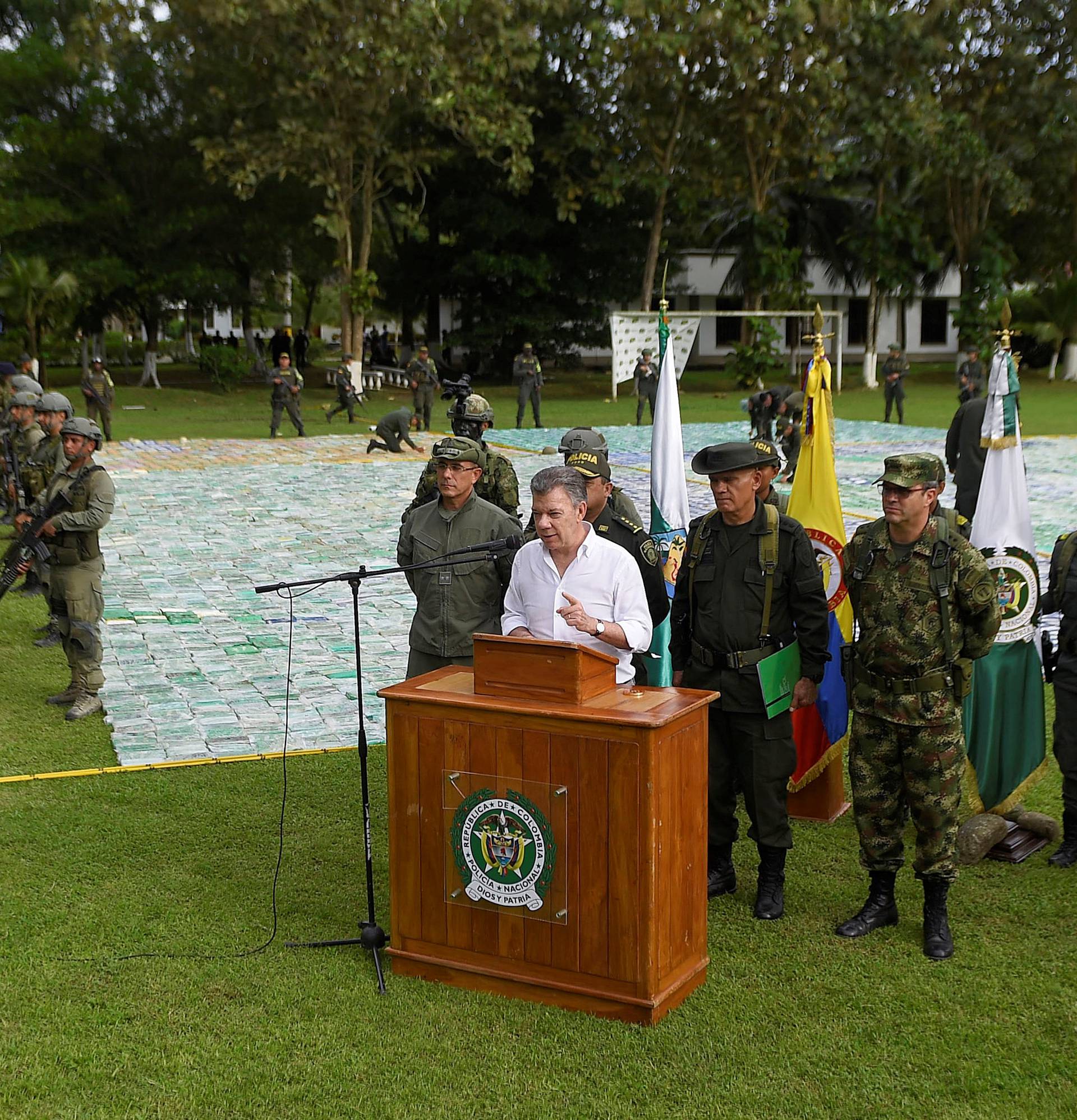 Colombia's President Juan Manuel Santos speaks after the seizure of more than 12 tons of cocaine in Apartado, Colombia