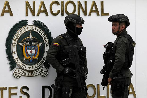 Police work close to the scene where a car bomb exploded, according to authorities, in Bogota