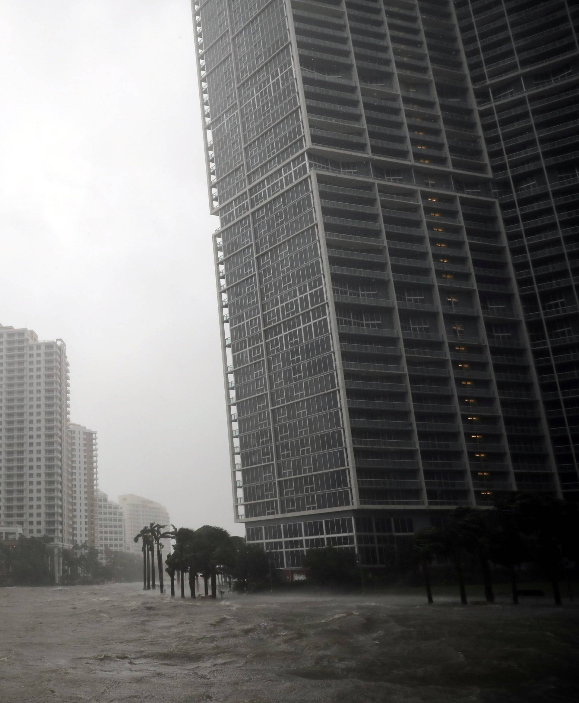 Water rises up to a sidewalk by the Miami river as Hurricane Irma arrives at south Florida, in downtown Miami, Florida, U.S.