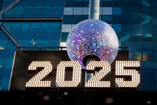 A newly created New Year's eve ball is raised for the first time above One Times Square ahead of the New Year's Eve ball drop in New York