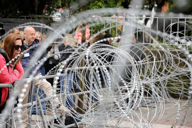 Polish members of the NATO-led Kosovo Force (KFOR) stand guard near a municipal office in Zvecan