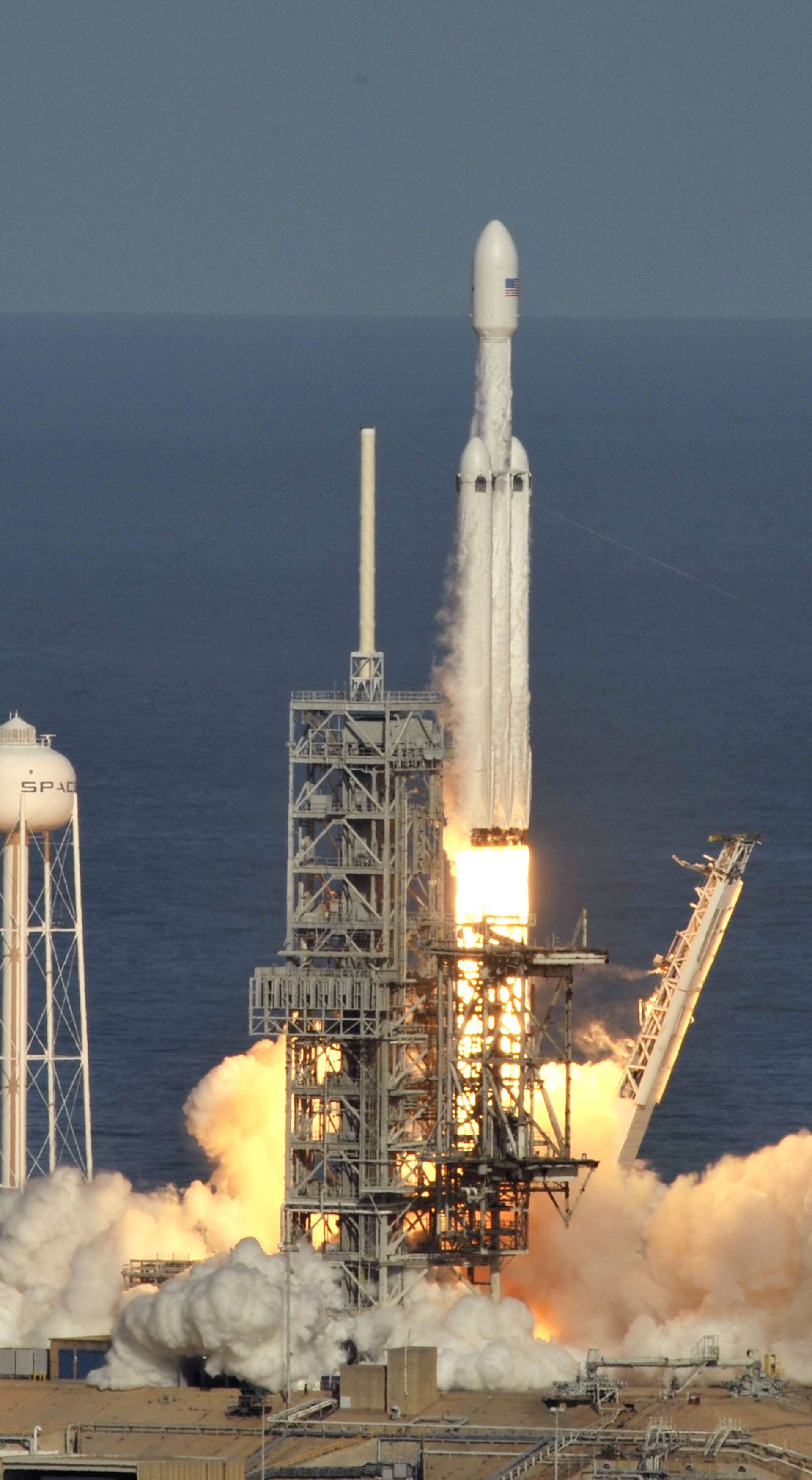 A SpaceX Falcon Heavy rocket lifts off from the Kennedy Space Center in Cape Canaveral