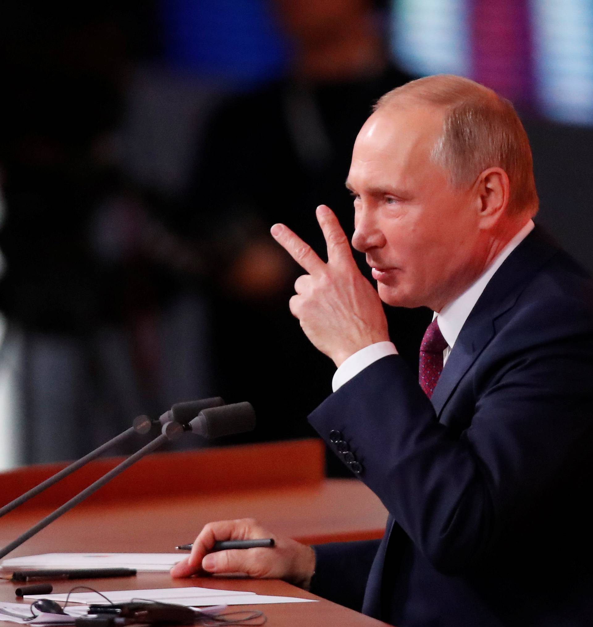 Russian President Vladimir Putin speaks during his annual end-of-year news conference in Moscow