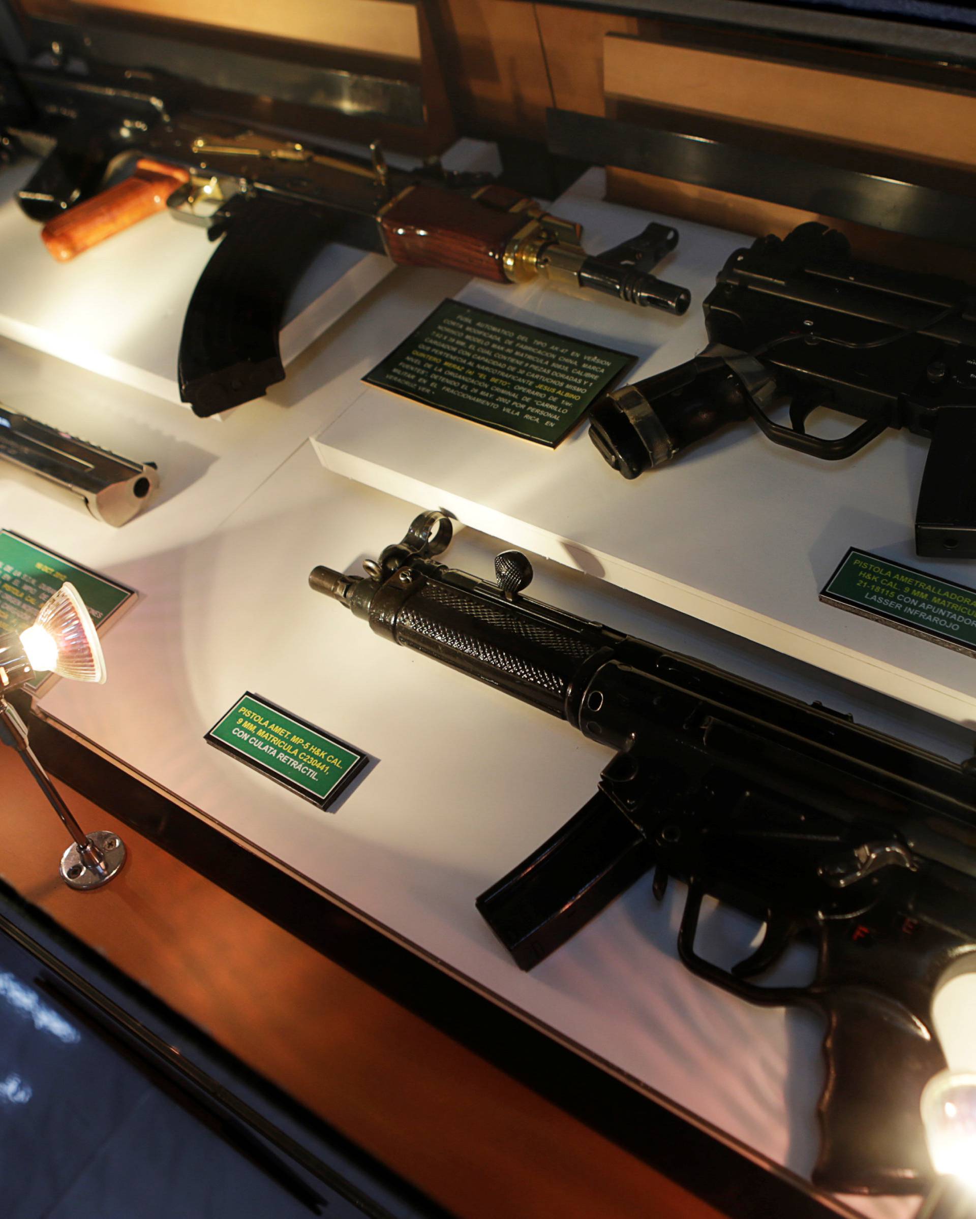 Guns are displayed in the Drugs Museum, used by the military to showcase to soldiers the lifestyles of Mexican drug lords, at the headquarters of the Ministry of Defense in Mexico City